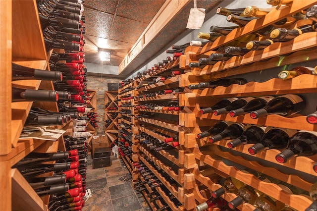 wine room featuring a drop ceiling