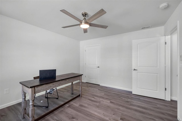 office featuring dark wood-type flooring and ceiling fan