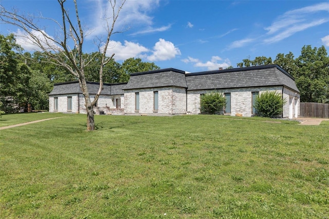 view of front of property with a front lawn