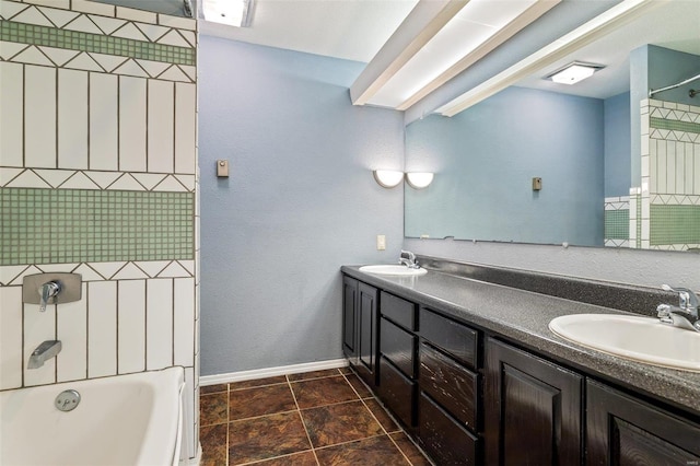 bathroom with vanity and tiled shower / bath combo