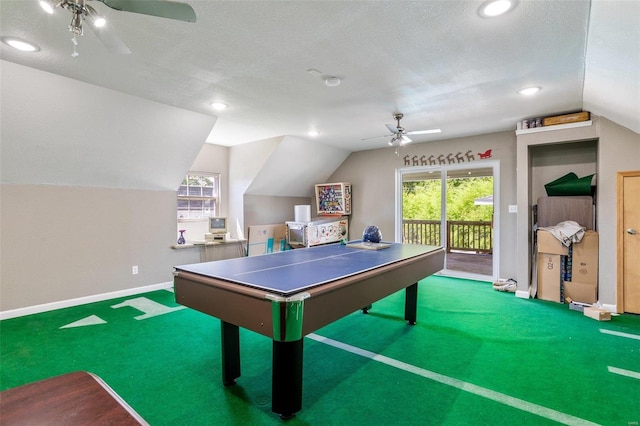 game room featuring carpet floors, a textured ceiling, ceiling fan, and lofted ceiling