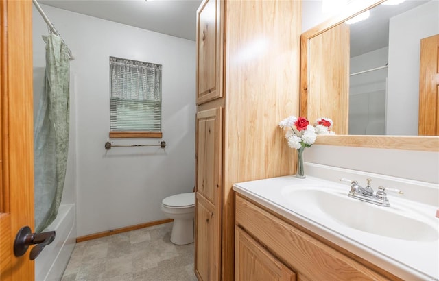 full bathroom featuring toilet, shower / bath combo, and vanity