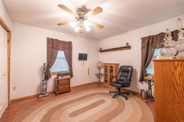 sitting room featuring ceiling fan and hardwood / wood-style flooring