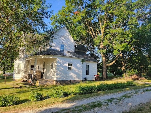 view of property exterior featuring a yard