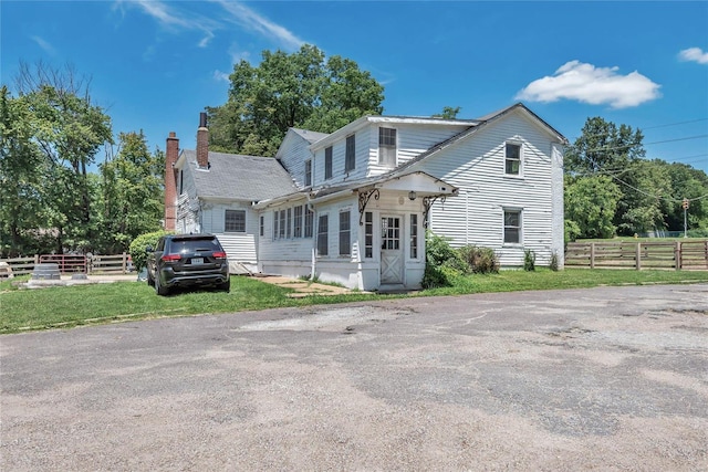 front of property with a front yard