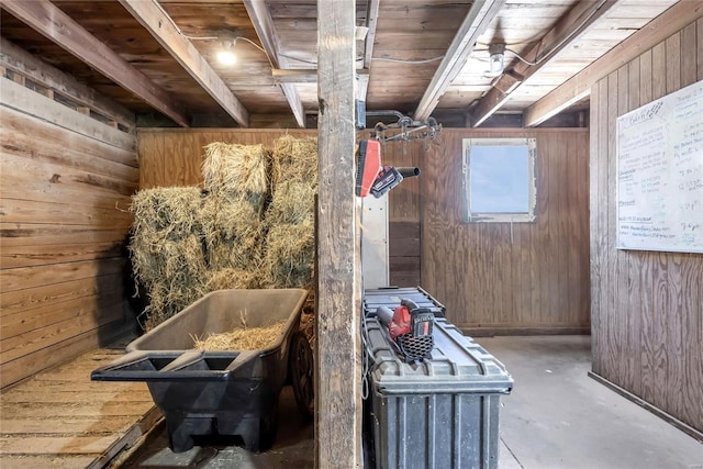 interior space featuring wooden walls