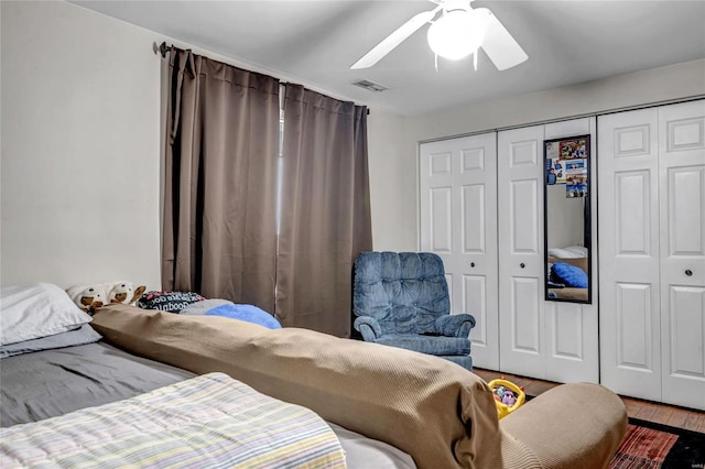 bedroom with ceiling fan and hardwood / wood-style floors