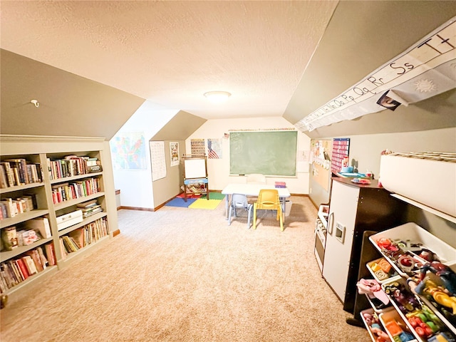 rec room featuring light colored carpet, built in features, a textured ceiling, and vaulted ceiling