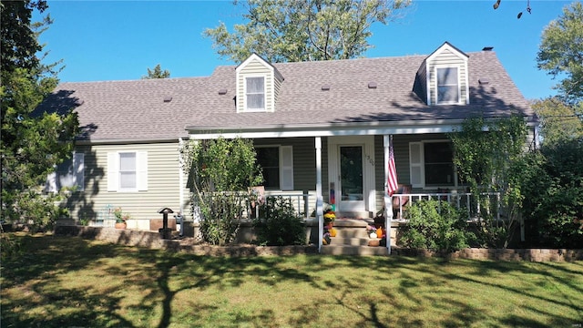 cape cod house with a front lawn and a porch