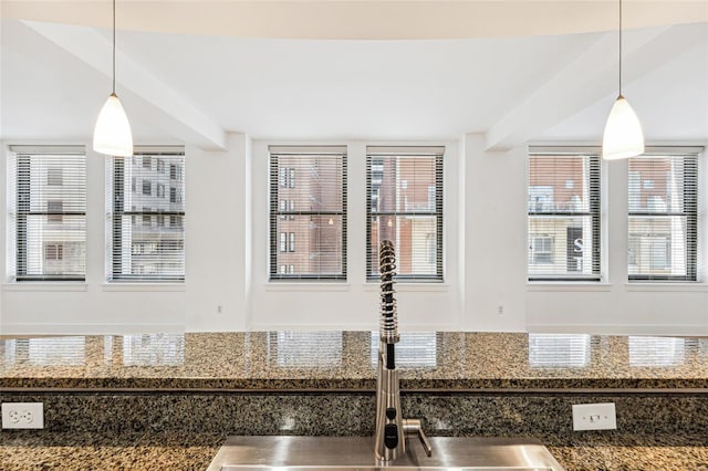 kitchen featuring hanging light fixtures and sink