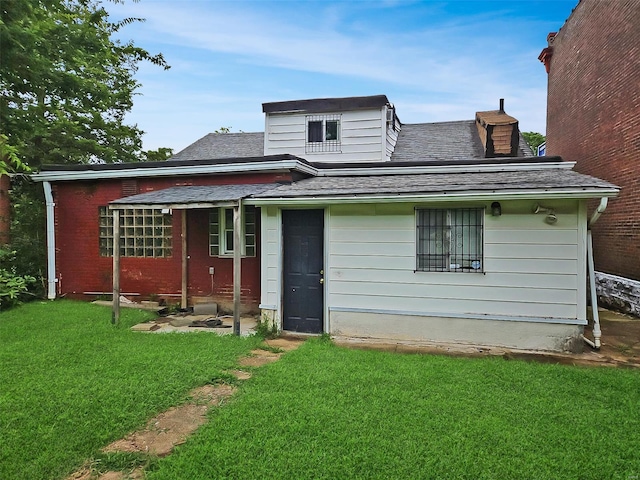 exterior space with a front yard