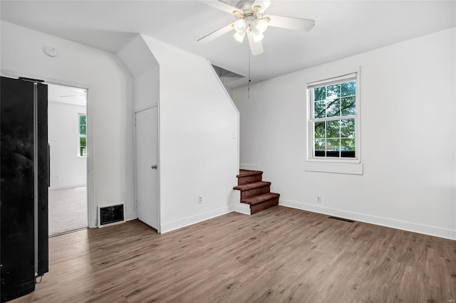 interior space with ceiling fan and light wood-type flooring