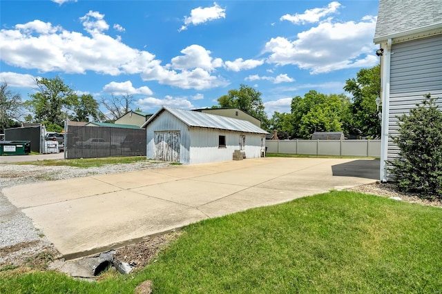 garage featuring a yard