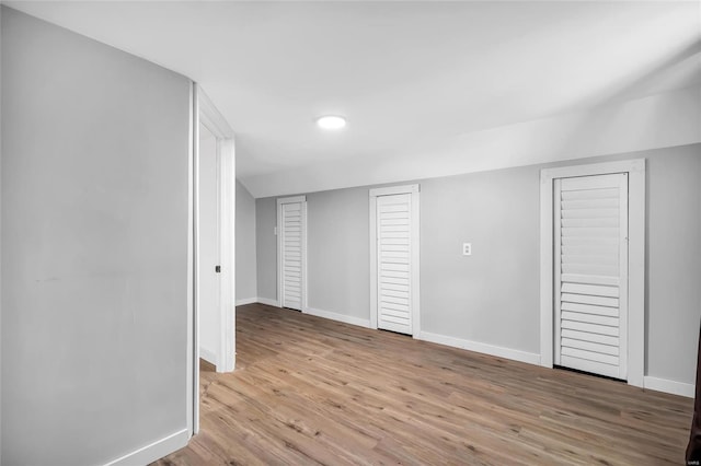 basement featuring light hardwood / wood-style flooring