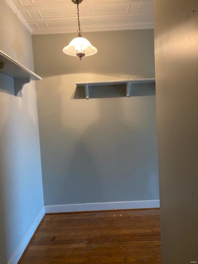 unfurnished dining area featuring dark wood-type flooring