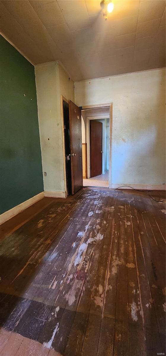 unfurnished room featuring wood-type flooring