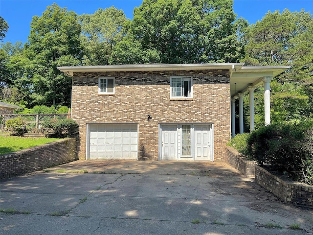 exterior space with a garage