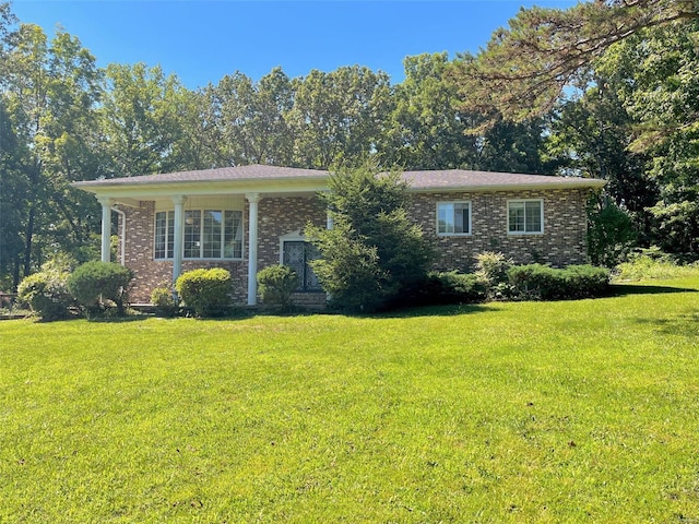 view of front of home with a front yard