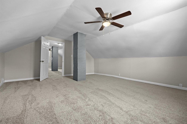 bonus room featuring ceiling fan, light colored carpet, and vaulted ceiling