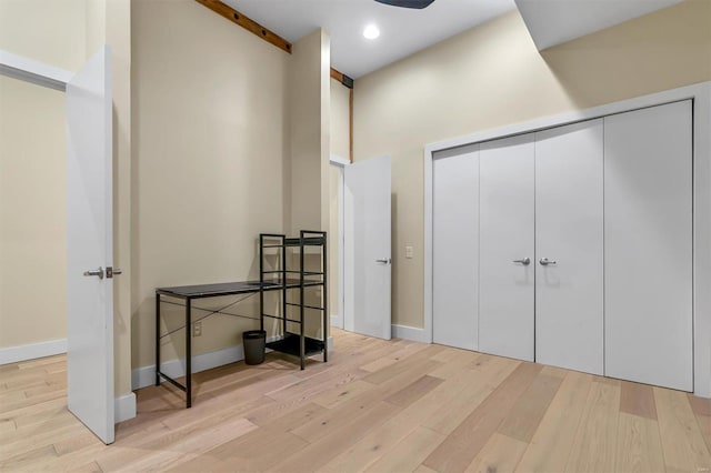 bedroom with a closet and light wood-type flooring