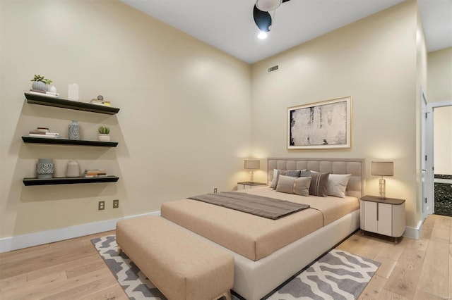 bedroom with light wood-type flooring