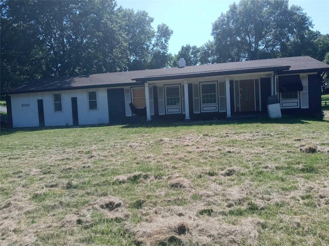 ranch-style house with a front yard