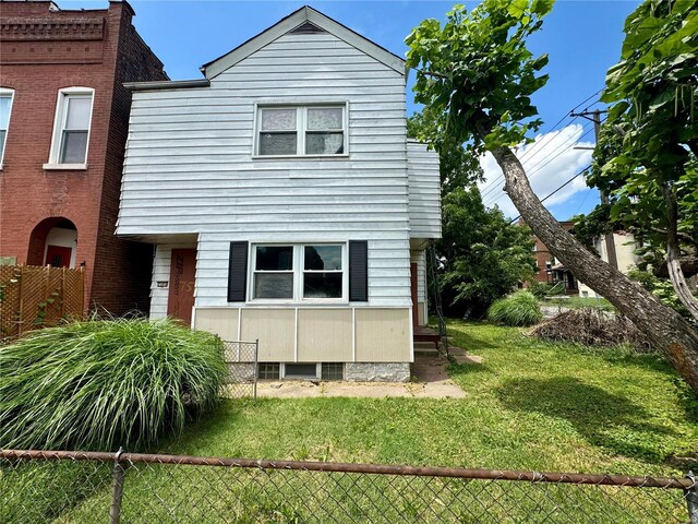 exterior space with a front yard