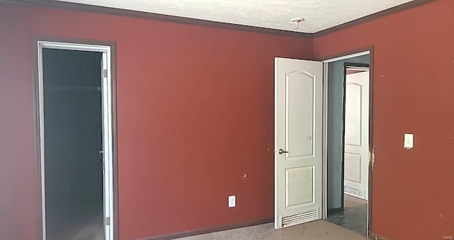 unfurnished bedroom with a closet