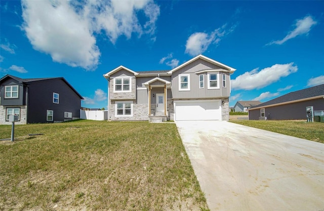 bi-level home with a garage and a front yard