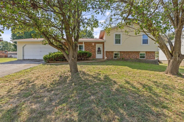 tri-level home with a front lawn