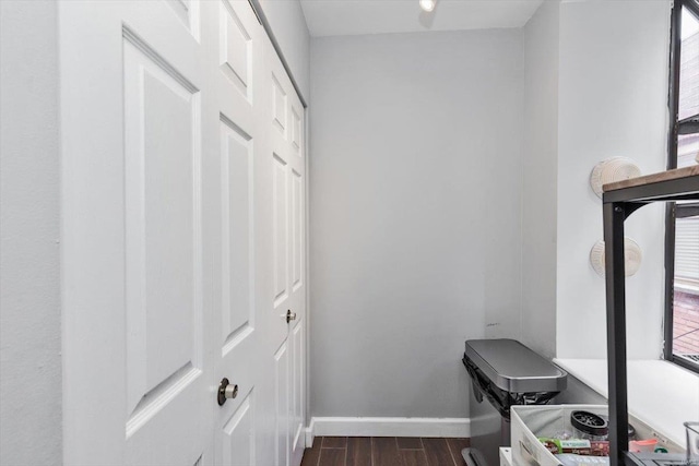 interior space with dark wood-type flooring