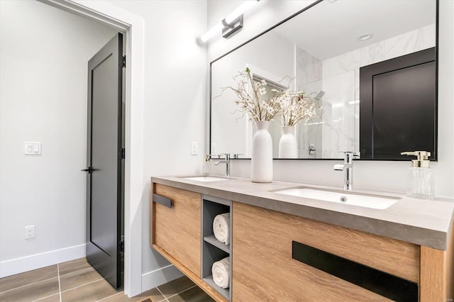 bathroom featuring vanity and a shower