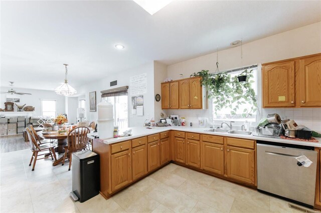 kitchen with ceiling fan, sink, dishwasher, and light tile flooring