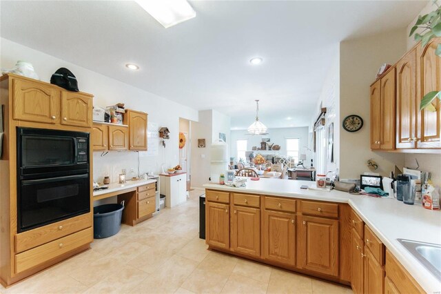 kitchen with hanging light fixtures, black appliances, light tile flooring, and kitchen peninsula