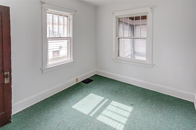 view of carpeted spare room