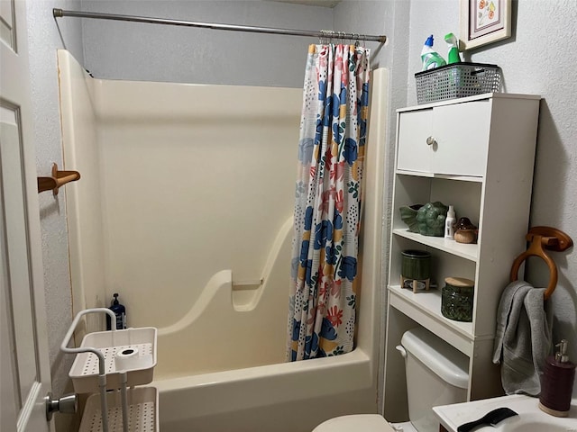 bathroom featuring toilet and shower / bathtub combination with curtain