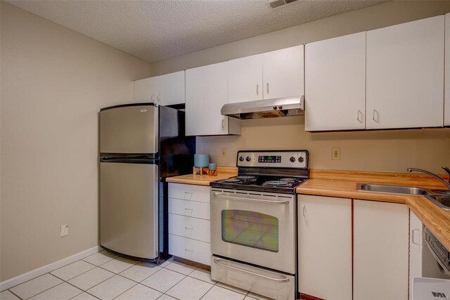 kitchen featuring a textured ceiling, stainless steel appliances, sink, and white cabinetry