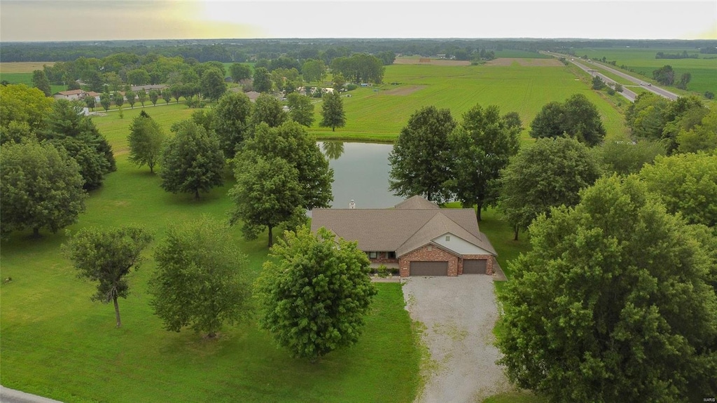 aerial view with a rural view and a water view