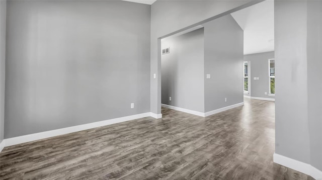 empty room with wood-type flooring