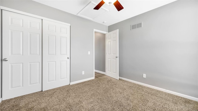 unfurnished bedroom with carpet floors, a closet, and ceiling fan