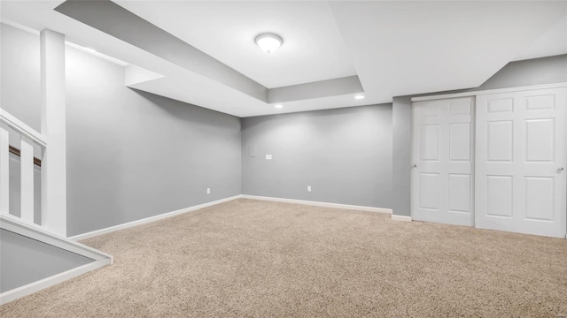 additional living space featuring carpet