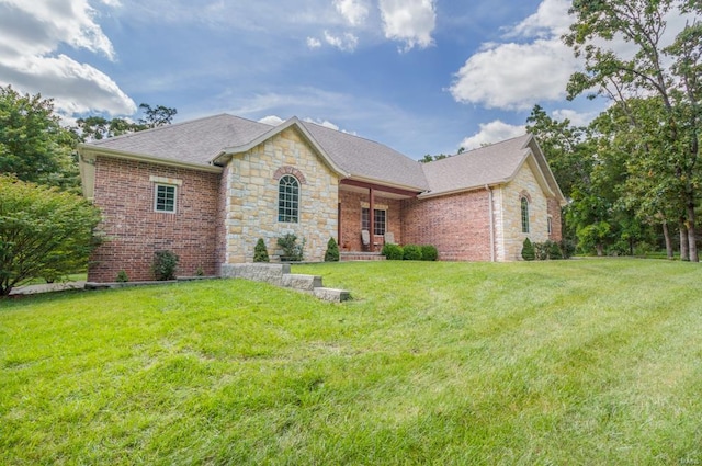 single story home with a front yard