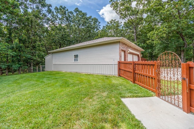 view of yard featuring a garage