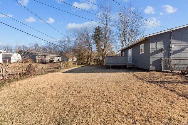 view of yard with a deck