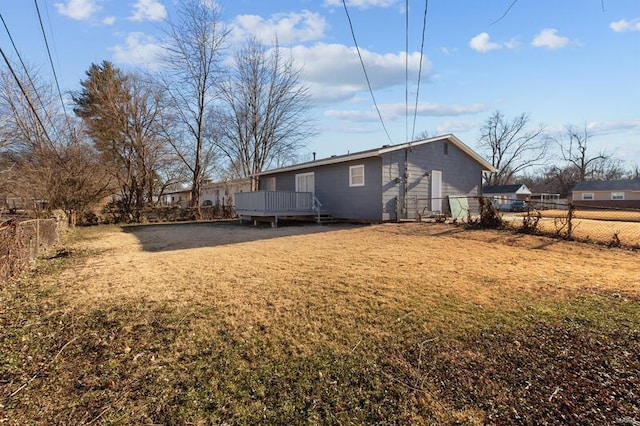 view of yard featuring a wooden deck