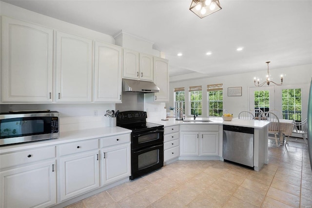 kitchen with appliances with stainless steel finishes, hanging light fixtures, a notable chandelier, white cabinets, and kitchen peninsula