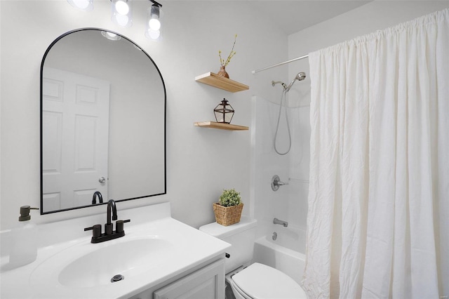 full bathroom with shower / bathtub combination with curtain, vanity, and toilet