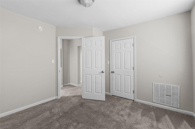 unfurnished bedroom featuring carpet floors