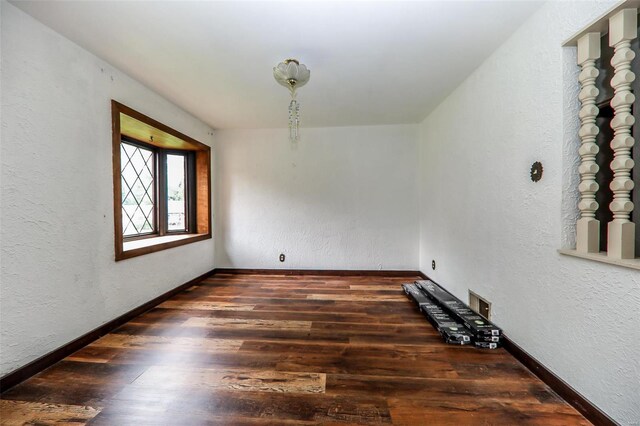 unfurnished dining area featuring dark hardwood / wood-style floors