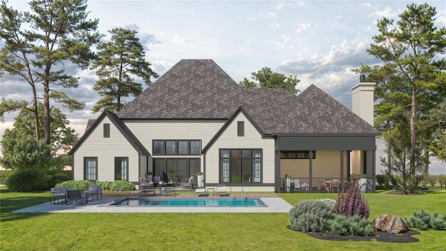 rear view of property featuring a patio and a yard